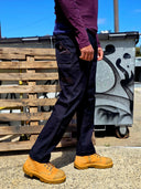 Black cargo work pants with nylon Oxford fabric reinforced fabric on pockets for durability