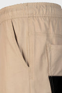 DFP PS2 work shorts showing side pocket in khaki. 